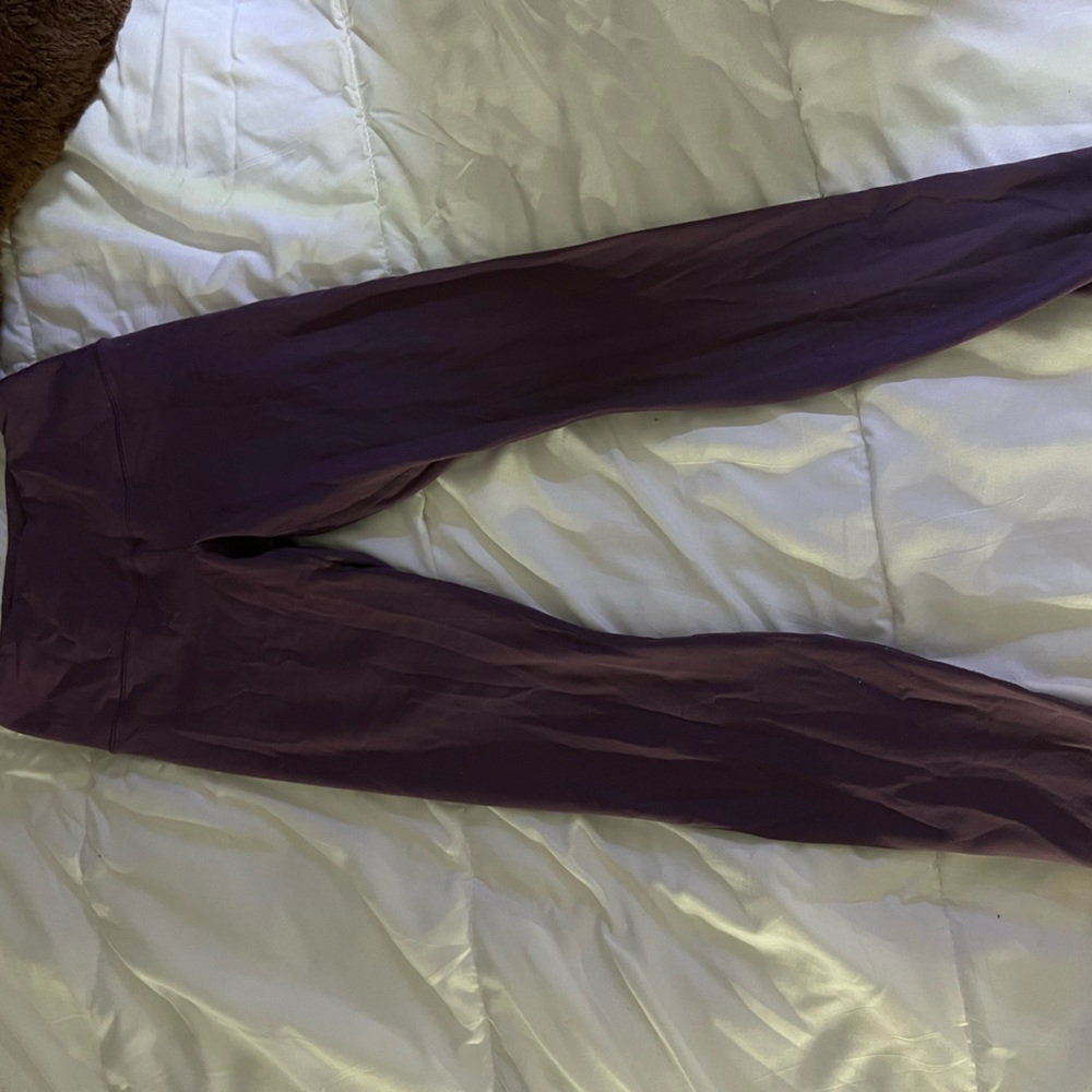 Purple leggings size small.